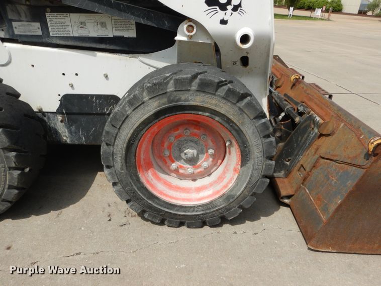 image for item GV9015 2014 Bobcat S590  skid steer loader