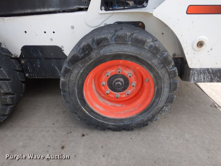 image for item GV9015 2014 Bobcat S590  skid steer loader