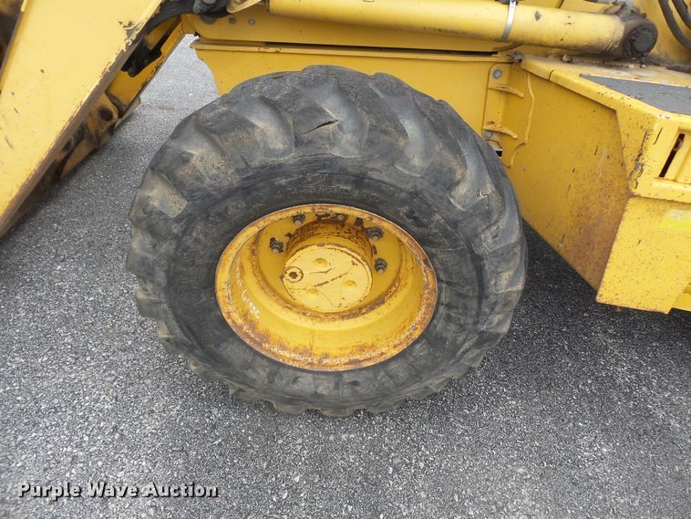 image for item DH7923 2005 John Deere 310SG  backhoe