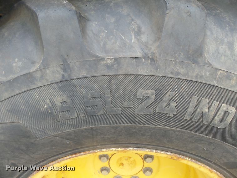 image for item DH7923 2005 John Deere 310SG  backhoe
