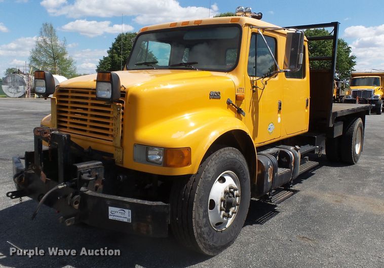 image for item DH7937 2002 International 4900 Crew Cab flatbed truck