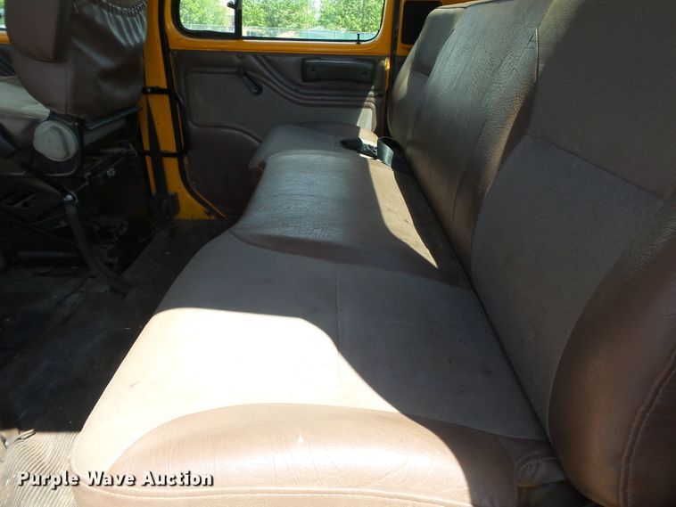 image for item DH7937 2002 International 4900 Crew Cab flatbed truck