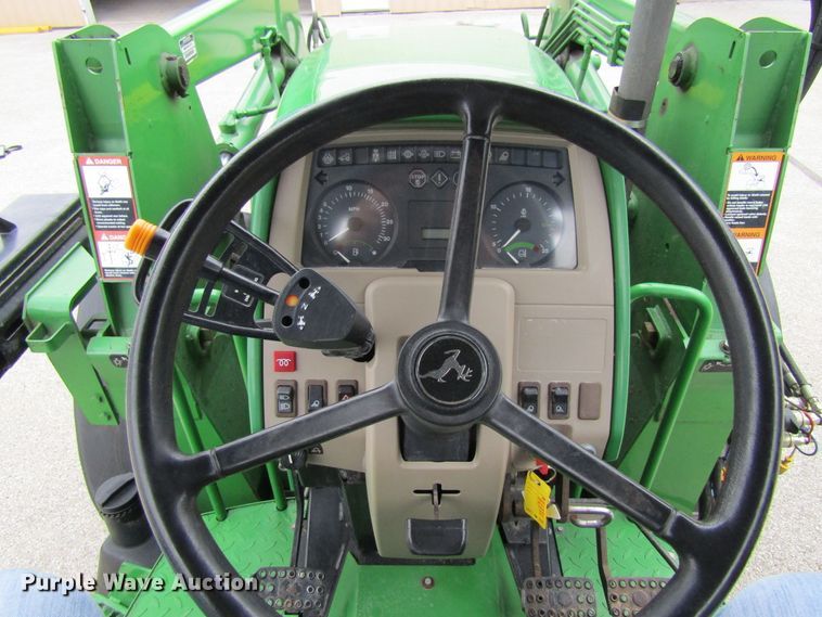 image for item FD9443 2003 John Deere 6420L  MFWD tractor