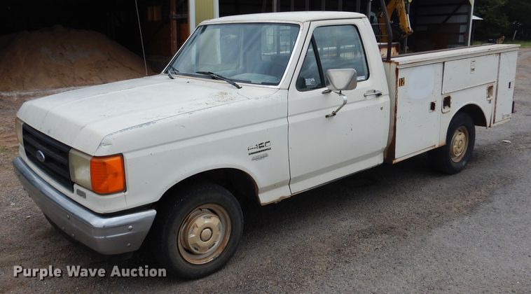 image for item GE9412 1987 Ford F150  utility bed pickup truck