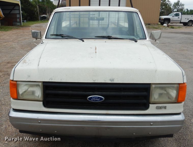 image for item GE9412 1987 Ford F150  utility bed pickup truck