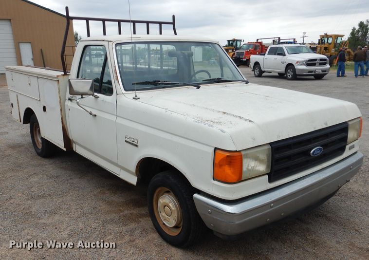 image for item GE9412 1987 Ford F150  utility bed pickup truck