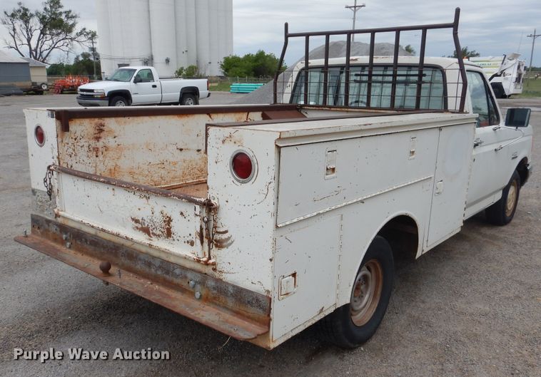 image for item GE9412 1987 Ford F150  utility bed pickup truck