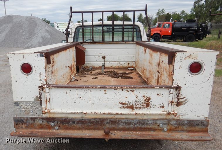 image for item GE9412 1987 Ford F150  utility bed pickup truck