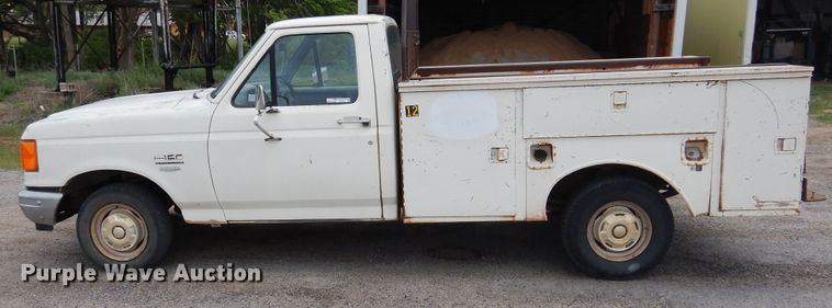 image for item GE9412 1987 Ford F150  utility bed pickup truck