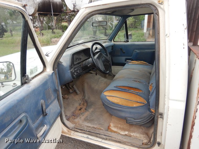 image for item GE9412 1987 Ford F150  utility bed pickup truck