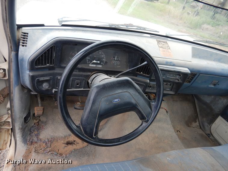 image for item GE9412 1987 Ford F150  utility bed pickup truck