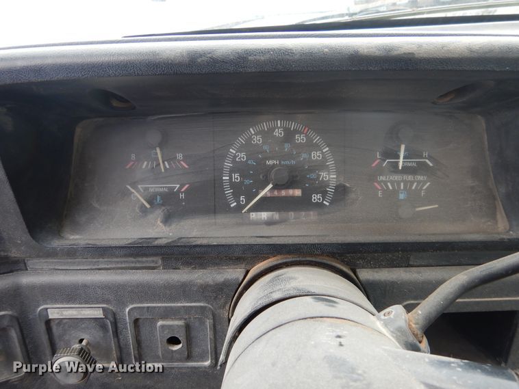 image for item GE9412 1987 Ford F150  utility bed pickup truck