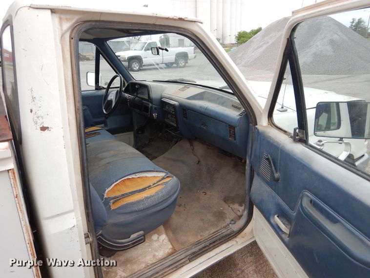 image for item GE9412 1987 Ford F150  utility bed pickup truck