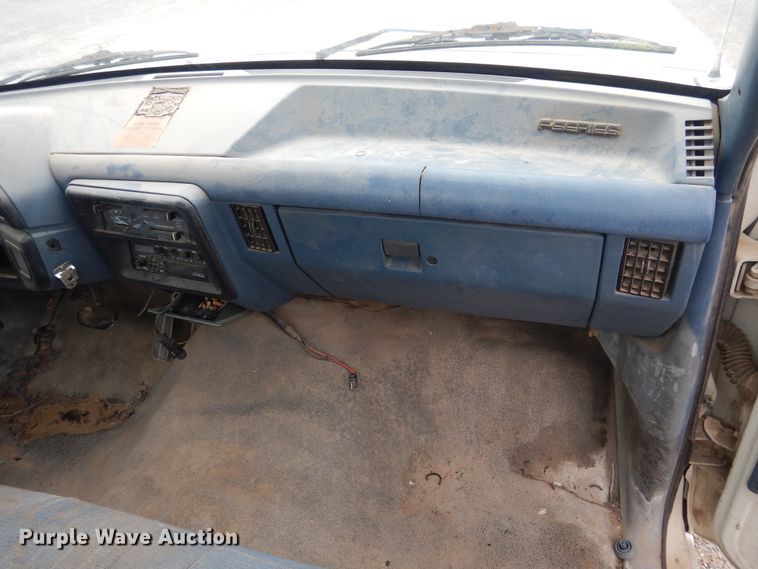 image for item GE9412 1987 Ford F150  utility bed pickup truck