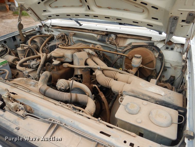 image for item GE9412 1987 Ford F150  utility bed pickup truck