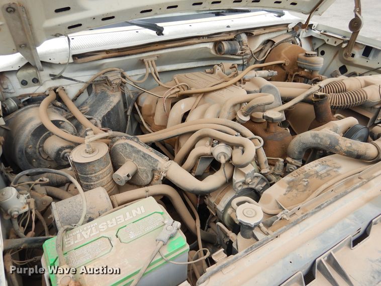 image for item GE9412 1987 Ford F150  utility bed pickup truck