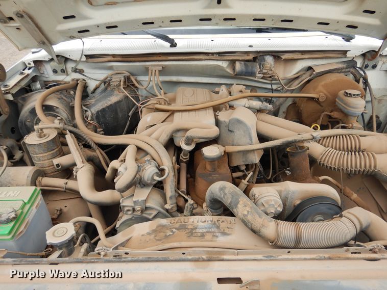 image for item GE9412 1987 Ford F150  utility bed pickup truck