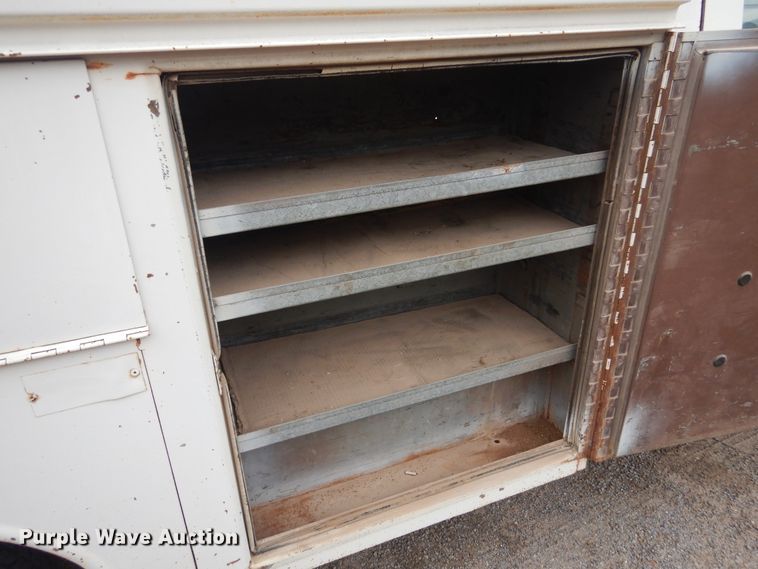 image for item GE9412 1987 Ford F150  utility bed pickup truck