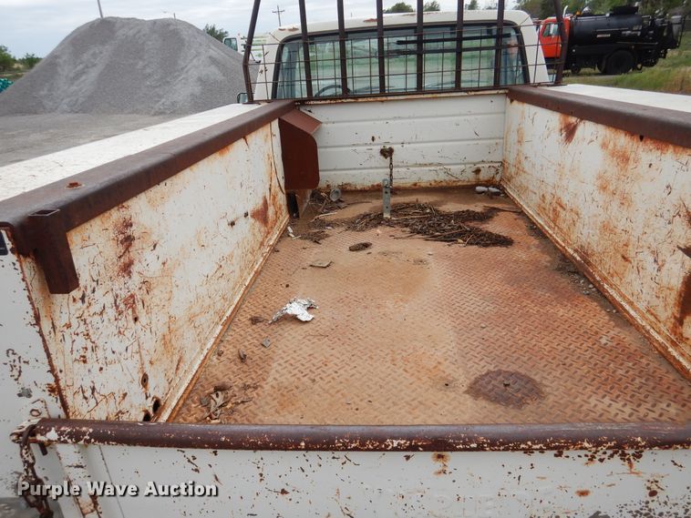 image for item GE9412 1987 Ford F150  utility bed pickup truck