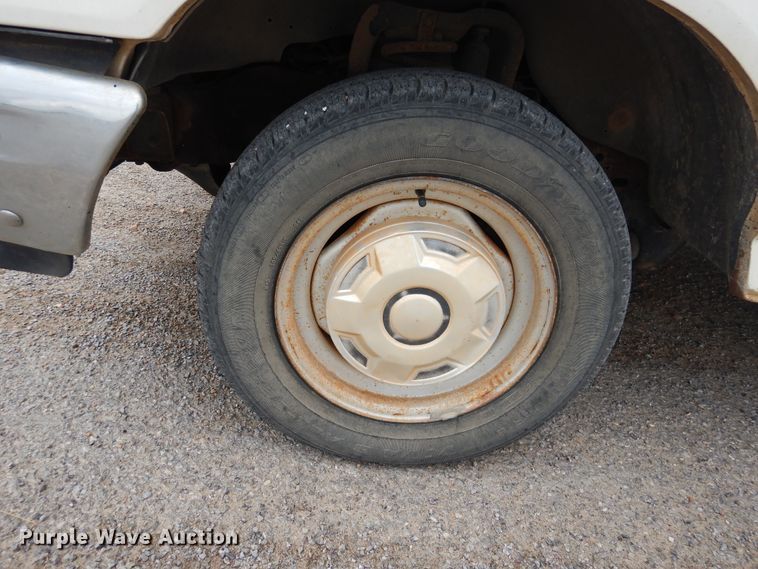 image for item GE9412 1987 Ford F150  utility bed pickup truck