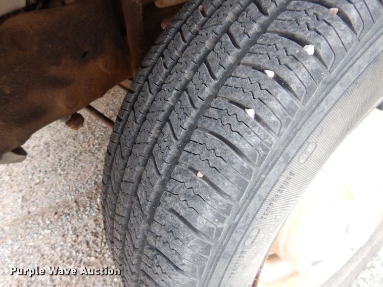 image for item GE9412 1987 Ford F150  utility bed pickup truck