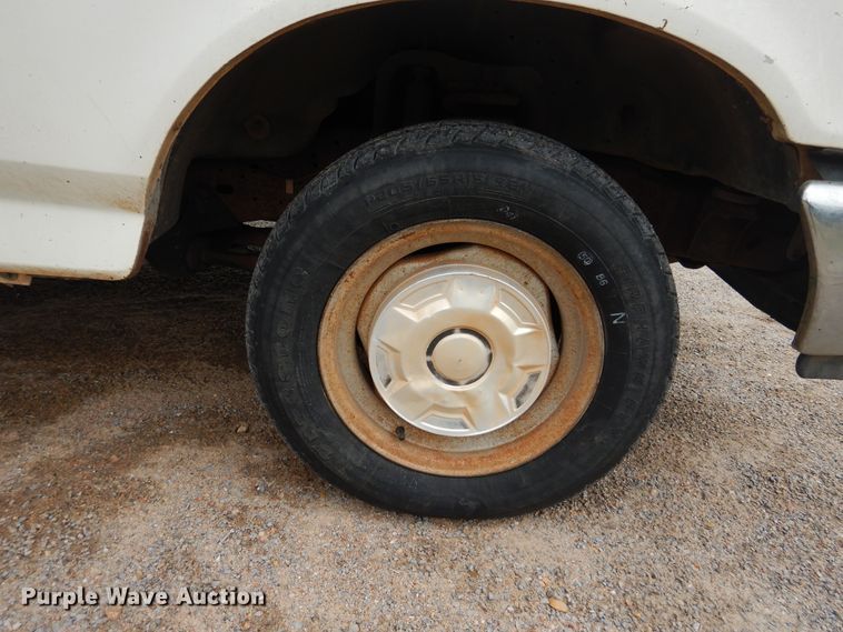 image for item GE9412 1987 Ford F150  utility bed pickup truck