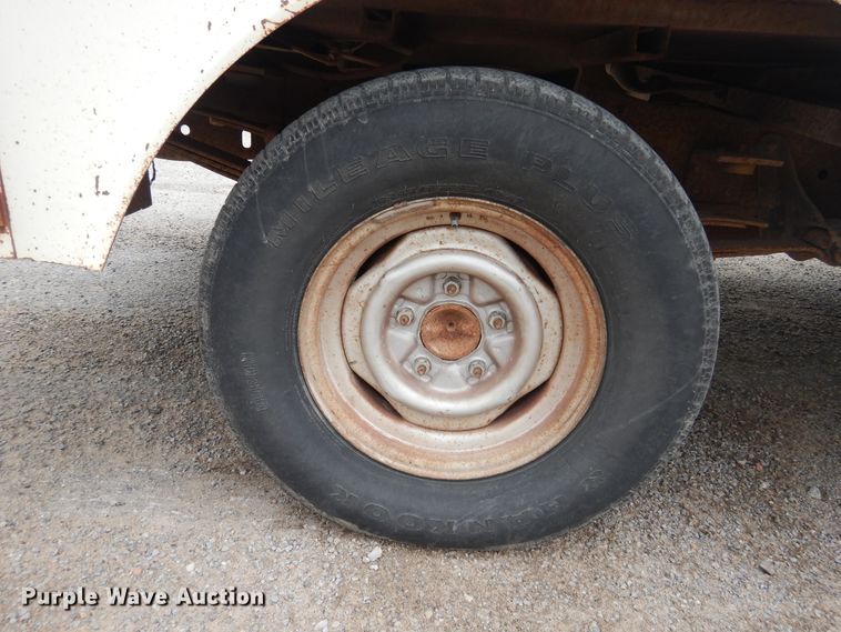 image for item GE9412 1987 Ford F150  utility bed pickup truck