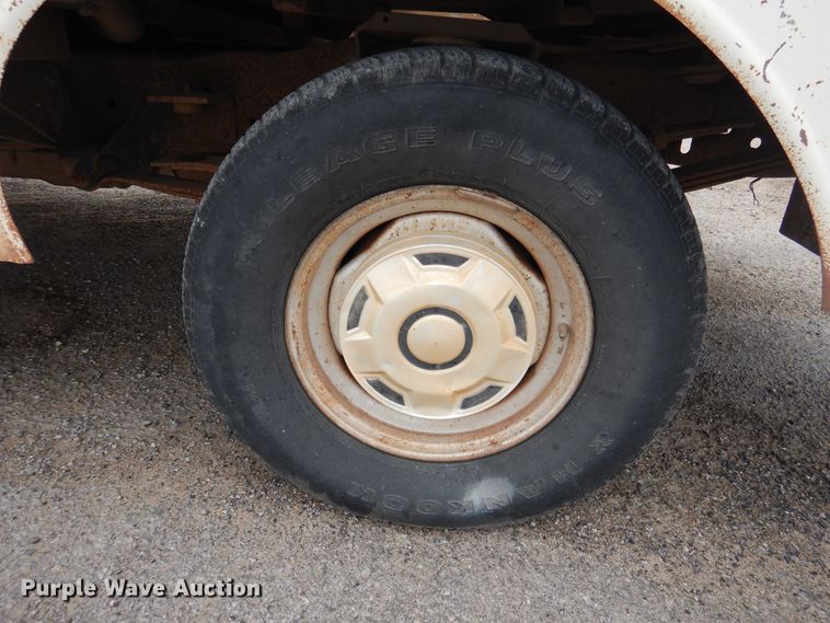 image for item GE9412 1987 Ford F150  utility bed pickup truck