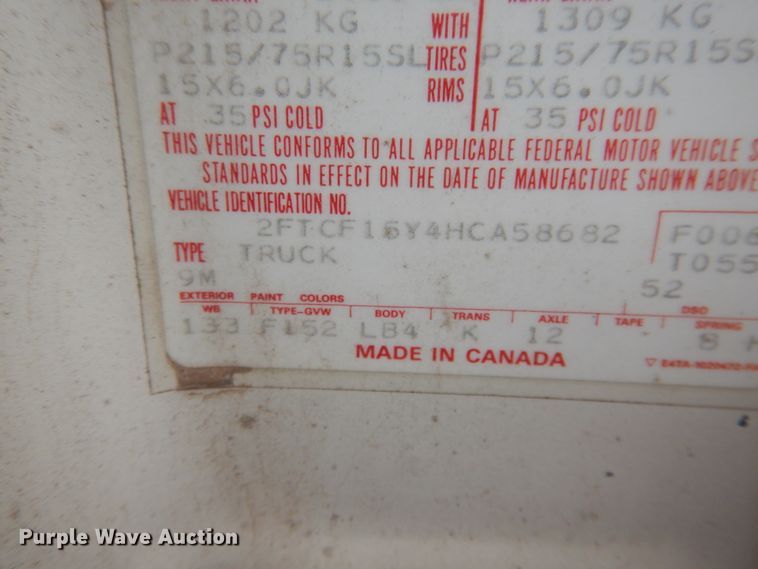 image for item GE9412 1987 Ford F150  utility bed pickup truck