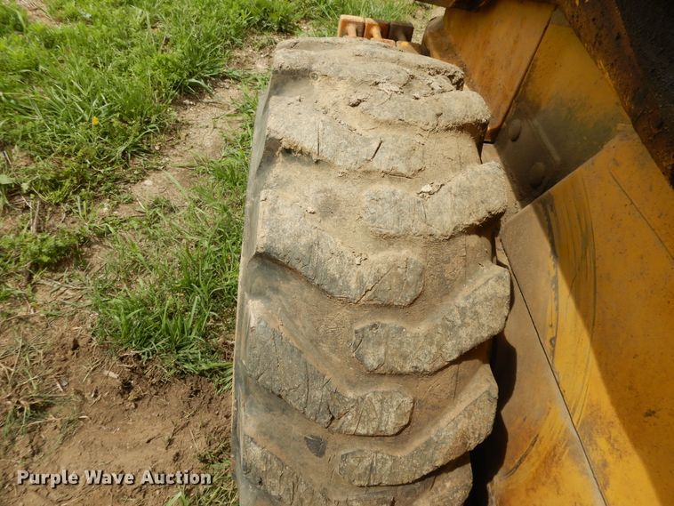 image for item DE5735 2000 John Deere 250  skid steer loader