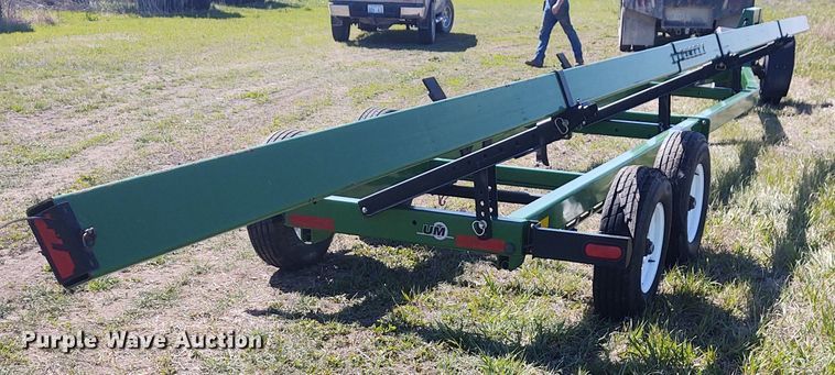 image for item DE6911 Unverferth Roadrunner header trailer