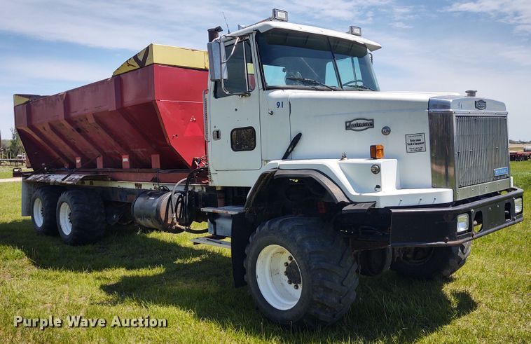 image for item DE6923 1992 Volvo White GMC Autocar applicator truck