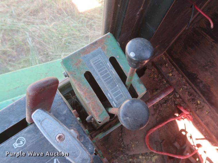 image for item GS9917 1983 John Deere 2420  windrower