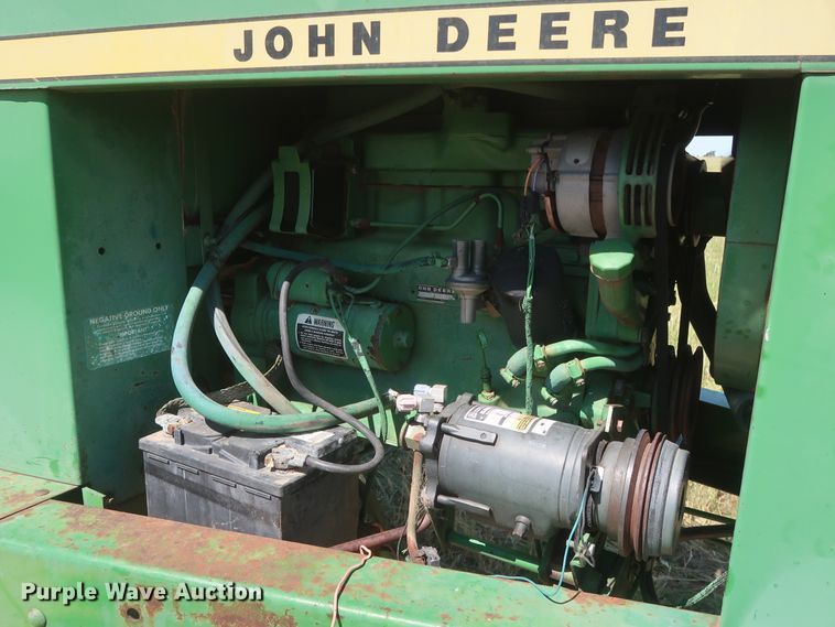 image for item GS9917 1983 John Deere 2420  windrower