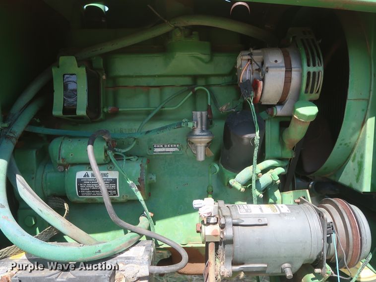 image for item GS9917 1983 John Deere 2420  windrower