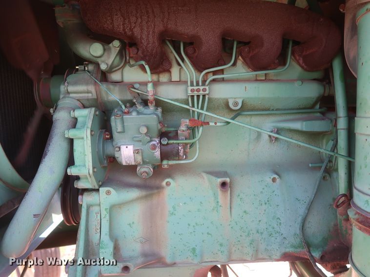 image for item GS9917 1983 John Deere 2420  windrower