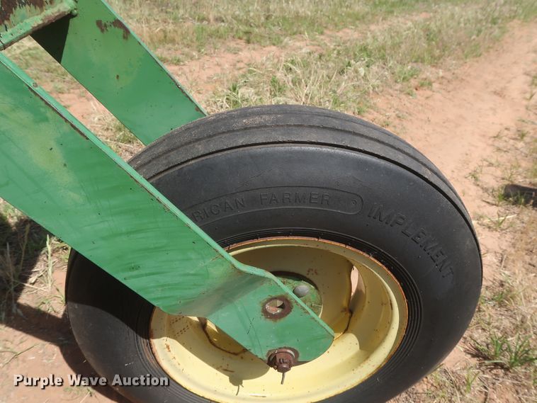 image for item GS9917 1983 John Deere 2420  windrower