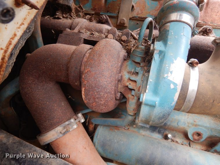 image for item DG6783 1987 International S1954/1900  dump flatbed truck