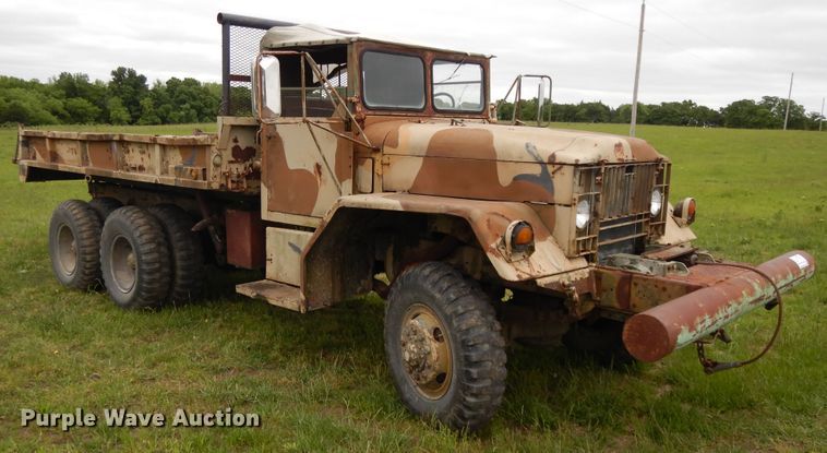 image for item DE5732 1967 Kaiser M44  flat dump bed truck