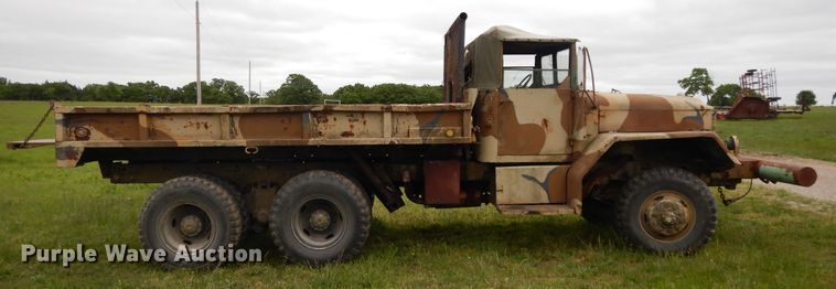 image for item DE5732 1967 Kaiser M44  flat dump bed truck