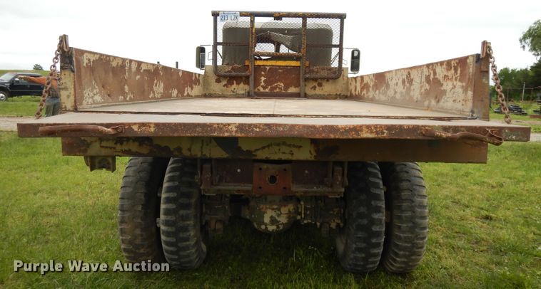 image for item DE5732 1967 Kaiser M44  flat dump bed truck
