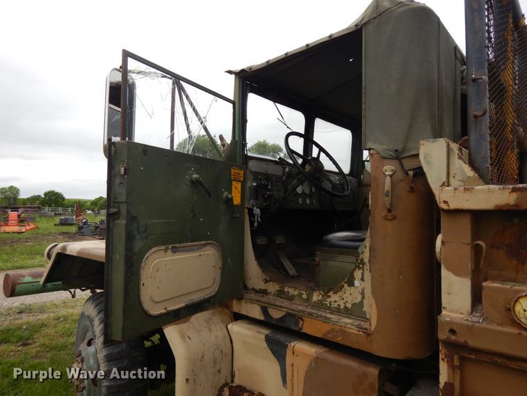 image for item DE5732 1967 Kaiser M44  flat dump bed truck