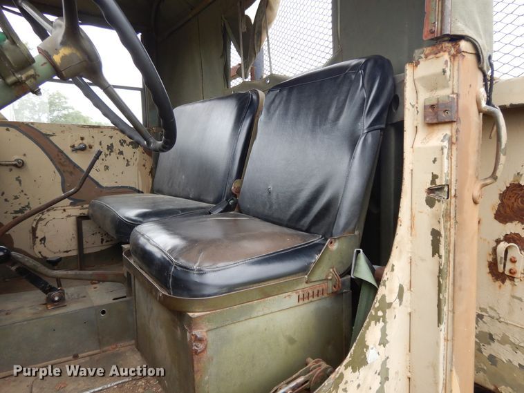 image for item DE5732 1967 Kaiser M44  flat dump bed truck