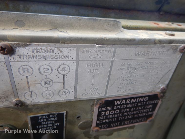 image for item DE5732 1967 Kaiser M44  flat dump bed truck