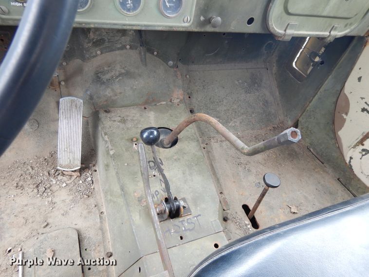 image for item DE5732 1967 Kaiser M44  flat dump bed truck