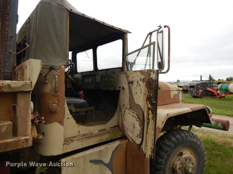 image for item DE5732 1967 Kaiser M44  flat dump bed truck