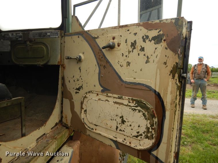 image for item DE5732 1967 Kaiser M44  flat dump bed truck