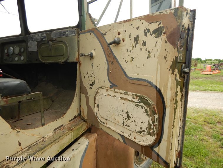 image for item DE5732 1967 Kaiser M44  flat dump bed truck