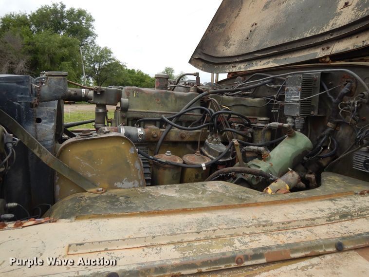 image for item DE5732 1967 Kaiser M44  flat dump bed truck