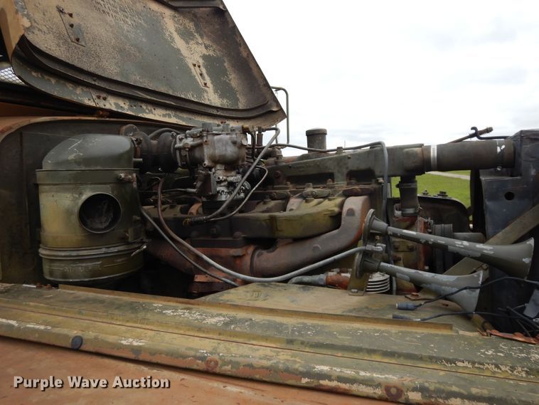 image for item DE5732 1967 Kaiser M44  flat dump bed truck